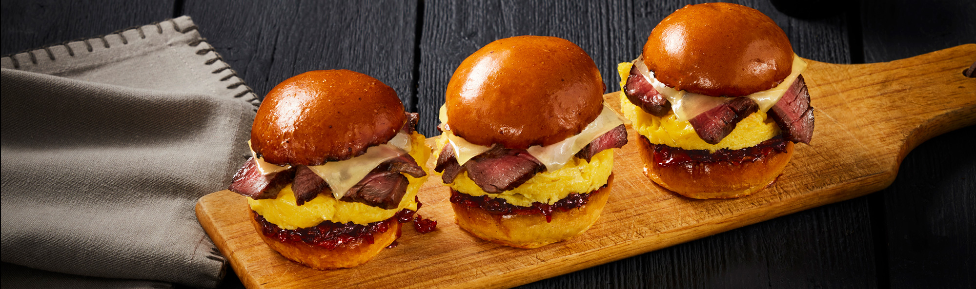 Steak + Egg Sliders w/ Bacon Jam + Gruyere Cheese